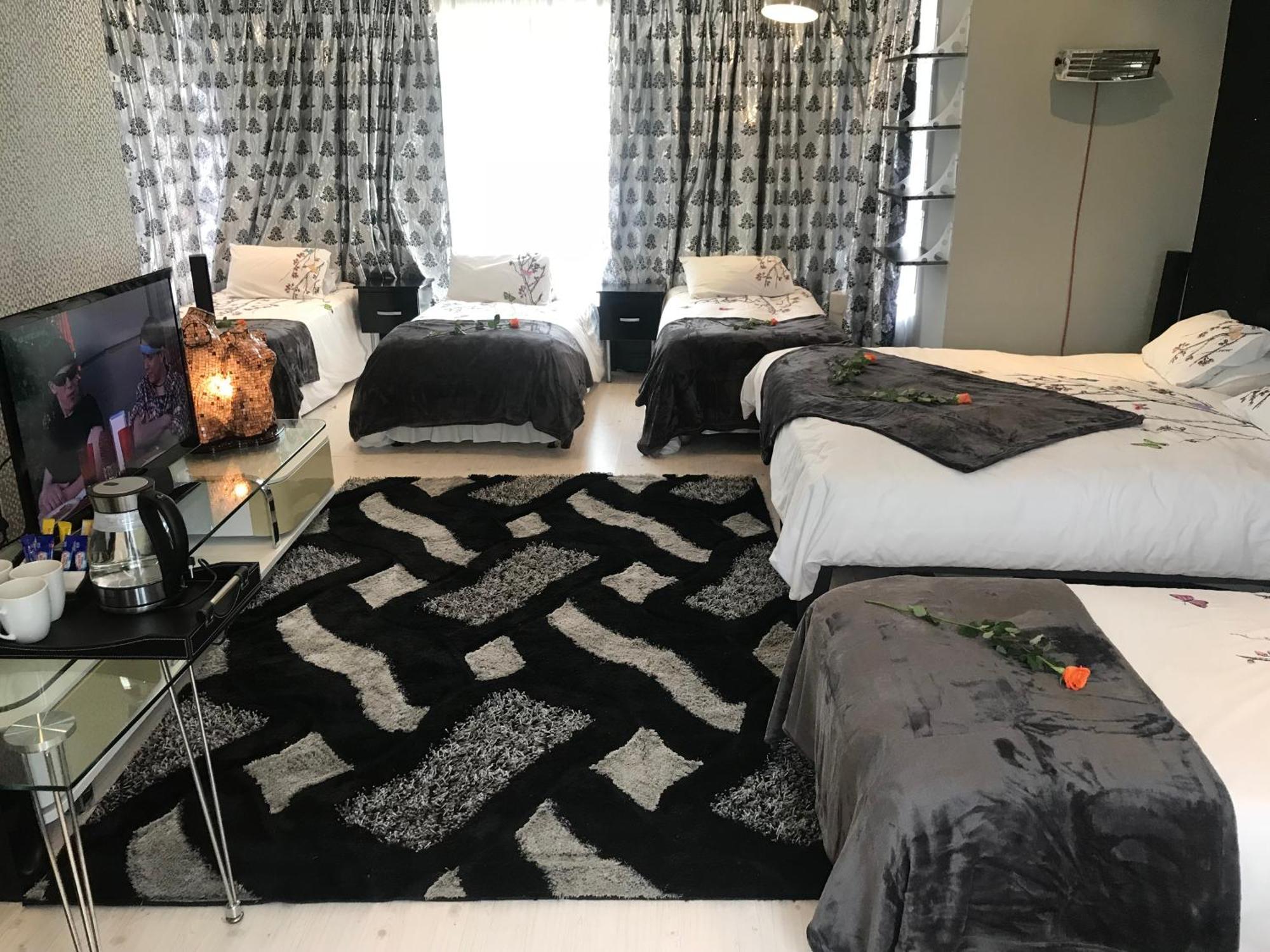 Africa Paradise - Or Tambo Airport Boutique Hotel Benoni Rum bild