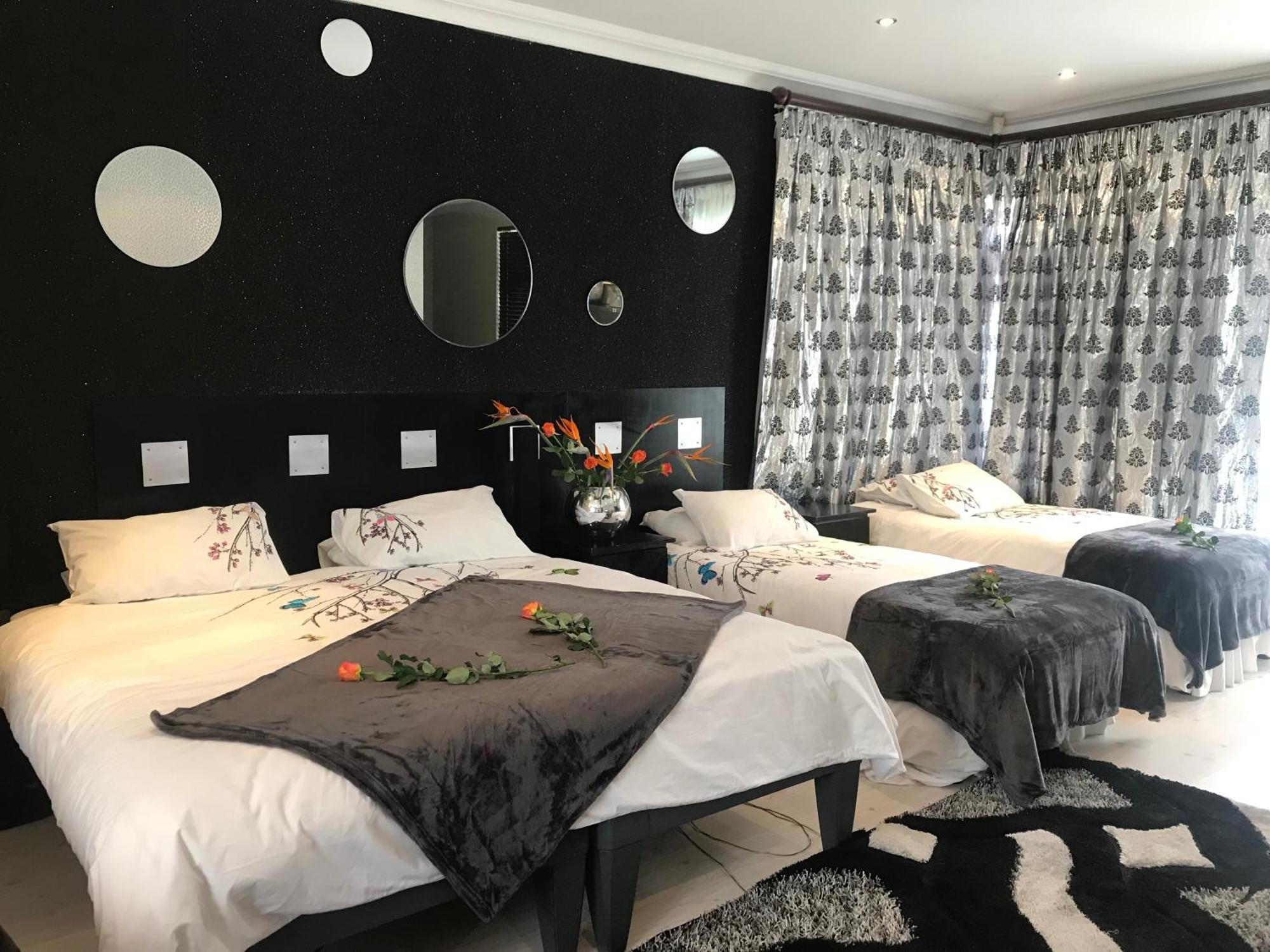 Africa Paradise - Or Tambo Airport Boutique Hotel Benoni Rum bild